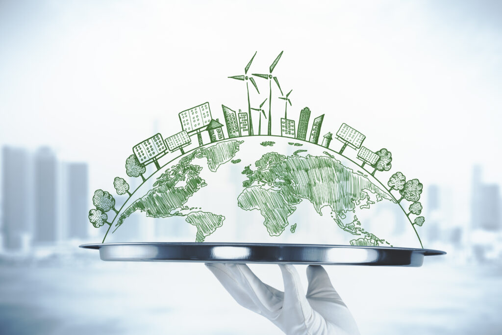 hand-holding-tray-with-creative-eco-globe-sketch